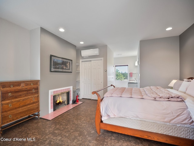 255 S Theresa Terrace Dr, Post Falls, ID 83854 - bedroom featuring carpet flooring, recessed lighting, a wall mounted AC, and a closet