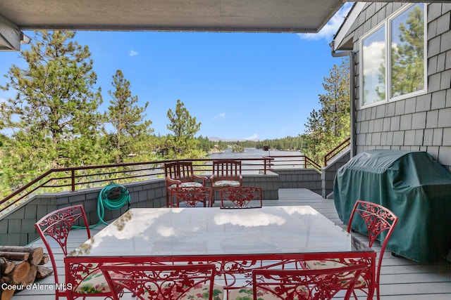 255 S Theresa Terrace Dr, Post Falls, ID 83854 - wooden deck with a grill