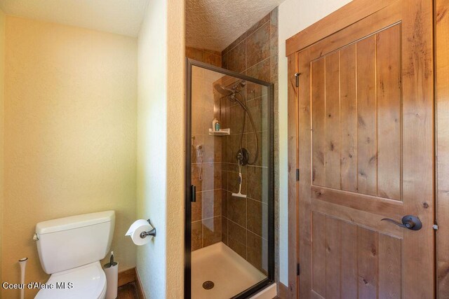 131 Long Dr, Priest Lake, ID 83856 - full bath featuring toilet and a shower stall