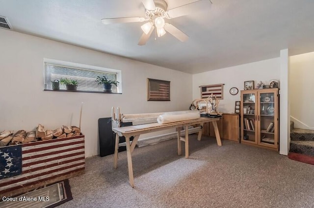 office area featuring carpet and ceiling fan