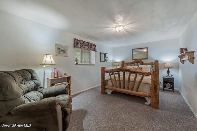 bedroom with carpet and baseboards