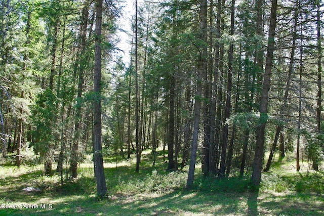 view of landscape with a view of trees