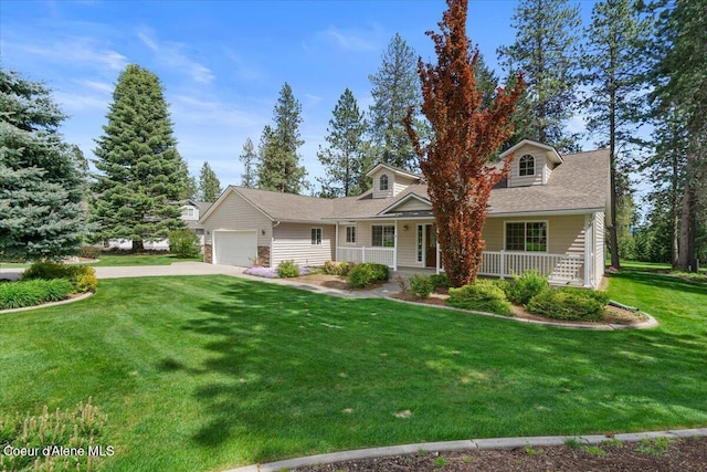 view of front of house with an attached garage, covered porch, concrete driveway, and a front lawn
