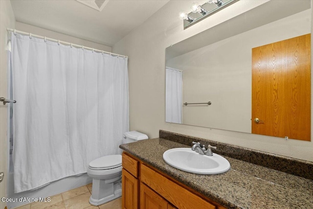full bathroom featuring toilet, vanity, tile patterned floors, and shower / bath combo