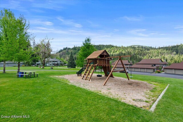 community playground featuring a yard