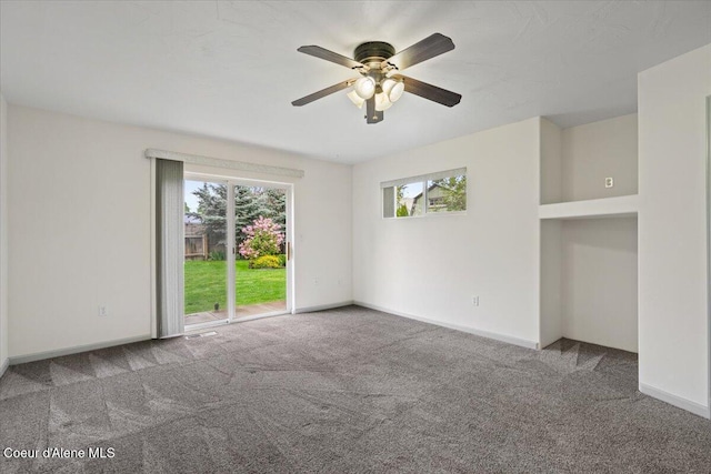 32350 N 7th Ave, Spirit Lake, ID 83869 - spare room with carpet flooring, plenty of natural light, ceiling fan, and baseboards