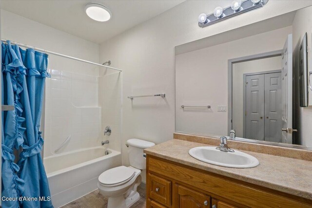 32350 N 7th Ave, Spirit Lake, ID 83869 - full bathroom featuring shower / tub combo with curtain, vanity, and toilet