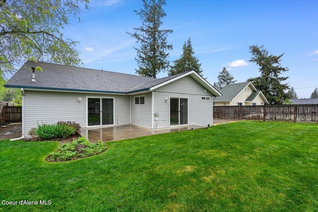 32350 N 7th Ave, Spirit Lake, ID 83869 - back of house with a patio area and a shingled roof