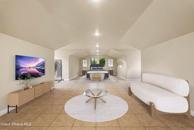1100 S Division Ave, Sandpoint, ID 83864 - living room with vaulted ceiling, light tile patterned flooring, and baseboards