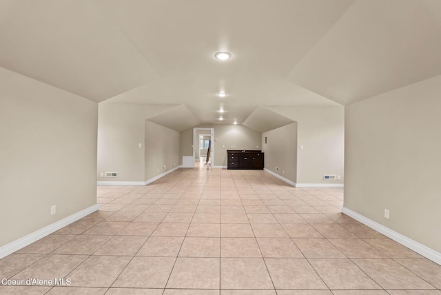 1100 S Division Ave, Sandpoint, ID 83864 - additional living space featuring lofted ceiling, visible vents, and baseboards