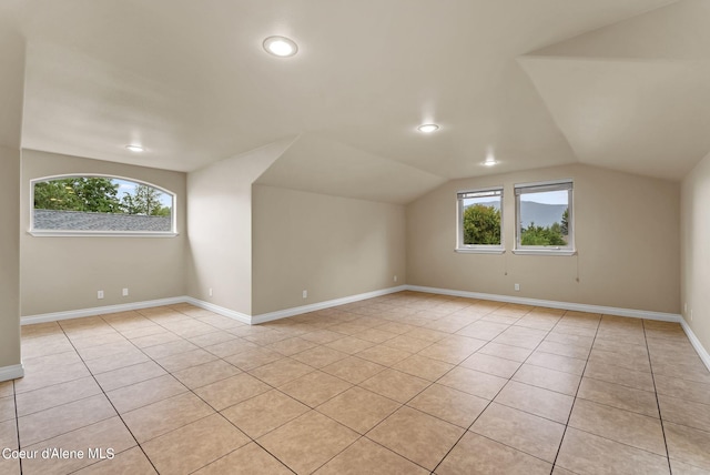 1100 S Division Ave, Sandpoint, ID 83864 - bonus room featuring lofted ceiling, recessed lighting, light tile patterned floors, and a healthy amount of sunlight