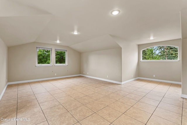 1100 S Division Ave, Sandpoint, ID 83864 - additional living space with lofted ceiling, baseboards, recessed lighting, and light tile patterned floors