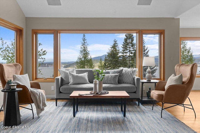 3677 S Capeview Ct, Coeur Dalene, ID 83814 - sunroom / solarium with a mountain view