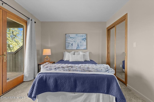3677 S Capeview Ct, Coeur Dalene, ID 83814 - bedroom featuring light colored carpet, baseboards, and a closet