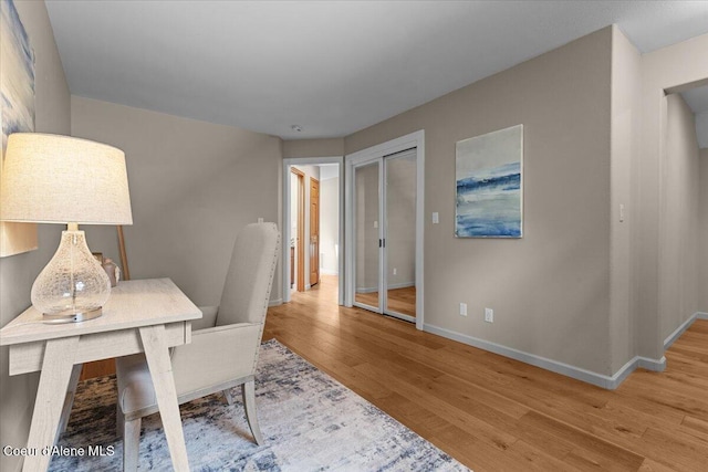 3677 S Capeview Ct, Coeur Dalene, ID 83814 - home office featuring baseboards and wood finished floors