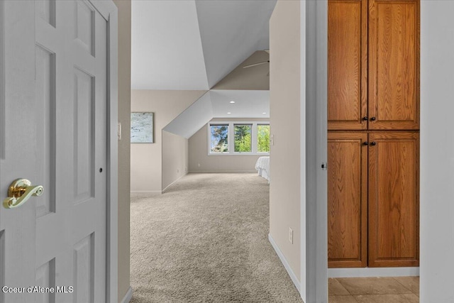 3677 S Capeview Ct, Coeur Dalene, ID 83814 - corridor featuring baseboards, carpet, and lofted ceiling