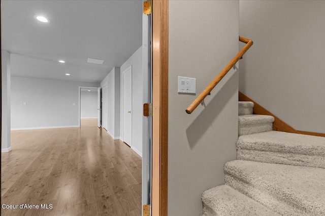 3677 S Capeview Ct, Coeur Dalene, ID 83814 - stairs featuring baseboards, recessed lighting, and wood finished floors