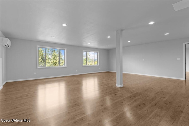 3677 S Capeview Ct, Coeur Dalene, ID 83814 - basement with recessed lighting, a wall mounted air conditioner, and baseboards