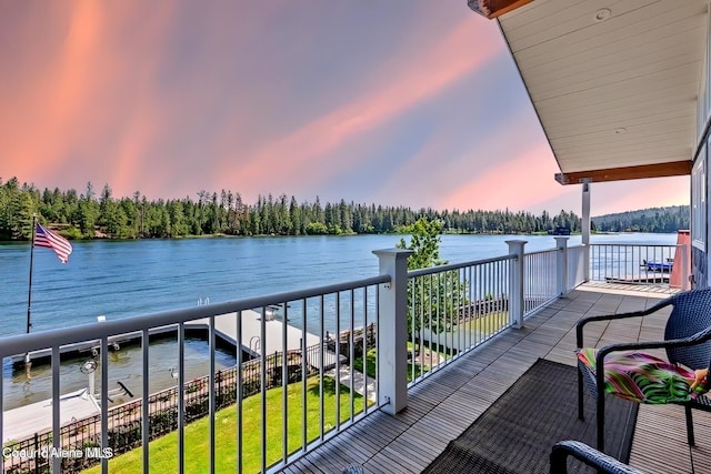 6339 W Harbor Dr, Coeur Dalene, ID 83814 - balcony at dusk featuring a water view