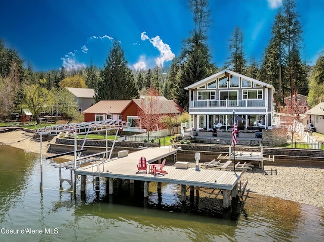 6339 W Harbor Dr, Coeur Dalene, ID 83814 - dock area featuring boat lift, a water view, and a balcony