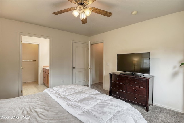 3310 N 17th St, Coeur Dalene, ID 83815 - bedroom with light carpet, ensuite bathroom, baseboards, and ceiling fan