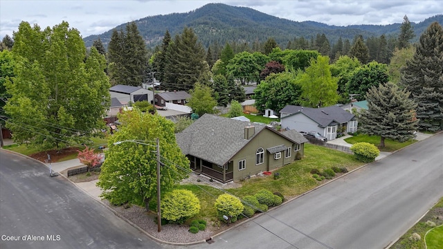 3310 N 17th St, Coeur Dalene, ID 83815 - bird's eye view of a heavily wooded area and a mountain backdrop