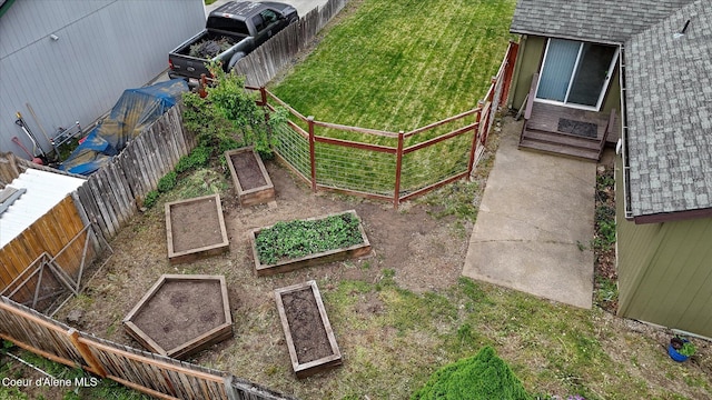 3310 N 17th St, Coeur Dalene, ID 83815 - view of yard featuring a garden