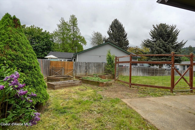 3310 N 17th St, Coeur Dalene, ID 83815 - view of yard with a garden