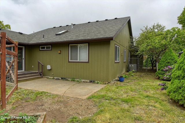 3310 N 17th St, Coeur Dalene, ID 83815 - rear view of property with a patio area, roof with shingles, and cooling unit