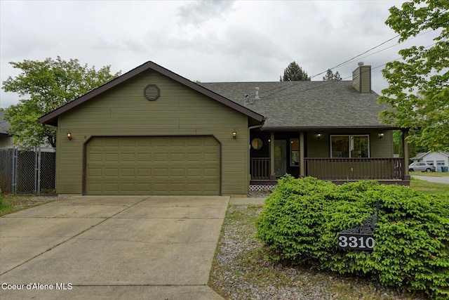 3310 N 17th St, Coeur Dalene, ID 83815 - ranch-style house featuring an attached garage, roof with shingles, driveway, and a chimney