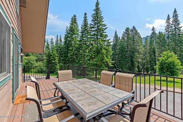 14105 E Marie Creek Rd, Coeur Dalene, ID 83814 - deck featuring outdoor dining area