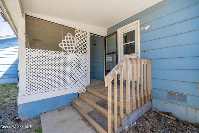 view of exterior entry featuring visible vents