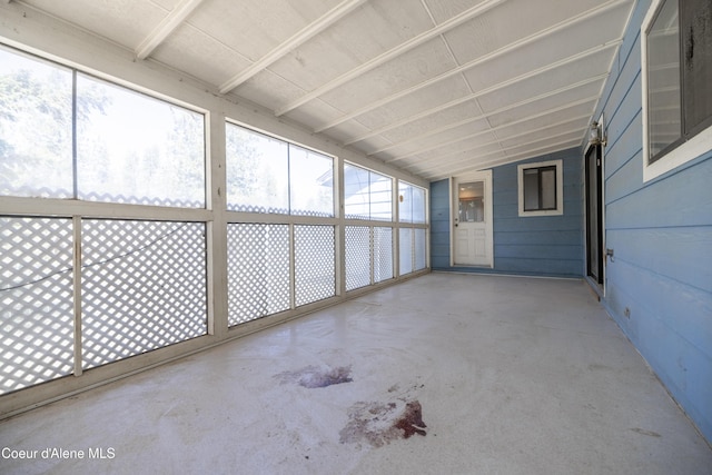 unfurnished sunroom featuring a healthy amount of sunlight