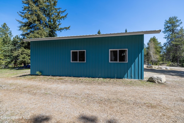 exterior space with metal roof
