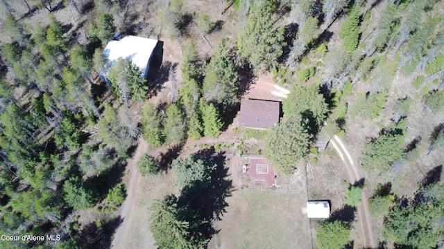 birds eye view of property with a rural view