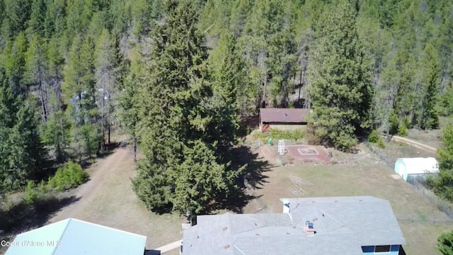 aerial view featuring a view of trees