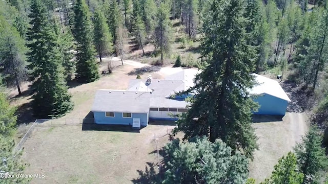 drone / aerial view with a forest view