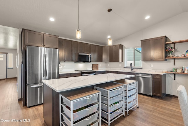 kitchen featuring open shelves, vaulted ceiling, dark brown cabinets, and stainless steel appliances