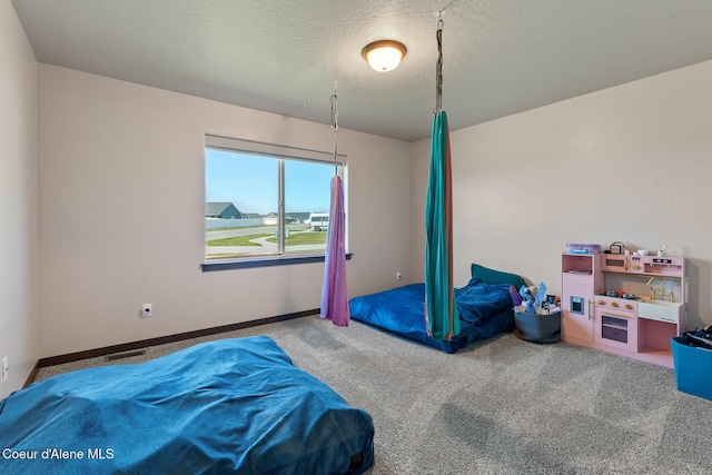 unfurnished bedroom featuring visible vents and carpet