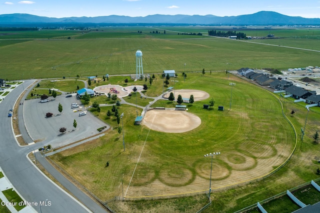 drone / aerial view featuring a mountain view and a rural view