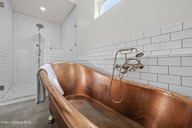 3515 N 7th St, Coeur Dalene, ID 83815 - detailed view of a tile shower, a freestanding tub, and tile walls