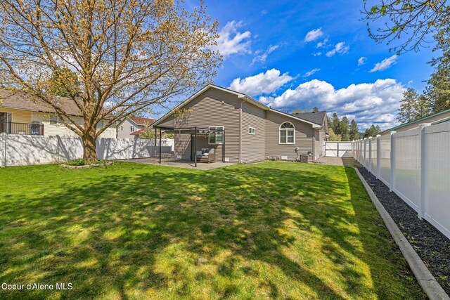 3515 N 7th St, Coeur Dalene, ID 83815 - back of house with a patio area