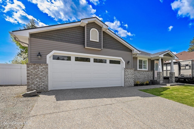 3515 N 7th St, Coeur Dalene, ID 83815 - single story home featuring driveway, an attached garage, and brick siding