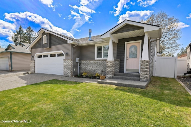 3515 N 7th St, Coeur Dalene, ID 83815 - view of front of home featuring concrete driveway, a garage, and brick siding
