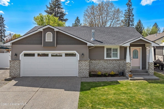 3515 N 7th St, Coeur Dalene, ID 83815 - view of front of property with brick siding, concrete driveway, an attached garage, and a front yard