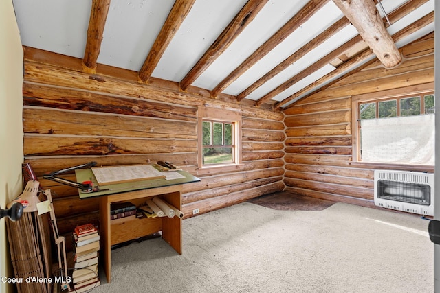 unfurnished office featuring heating unit, rustic walls, vaulted ceiling with beams, and carpet