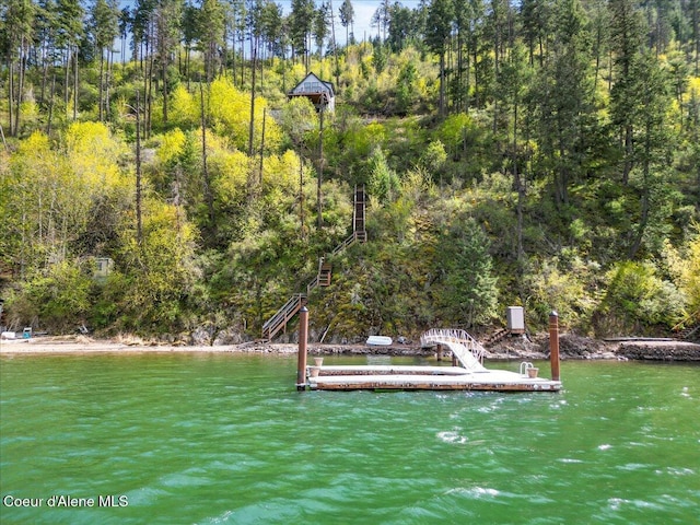 7809 E Bridger Trl, Harrison, ID 83833 - dock area with a water view and a forest view
