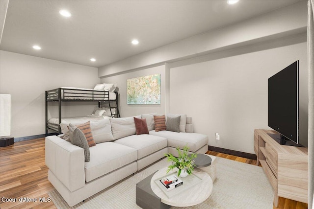 7809 E Bridger Trl, Harrison, ID 83833 - bedroom featuring recessed lighting, baseboards, and wood finished floors