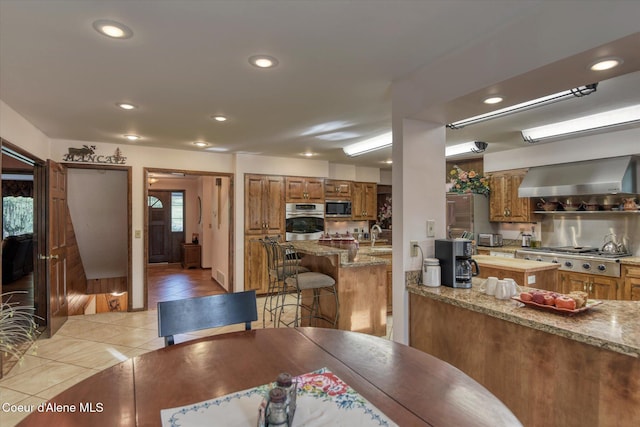 2885 S Folsom Ridge Rd, Coeur Dalene, ID 83814 - dining room featuring light tile patterned floors and recessed lighting
