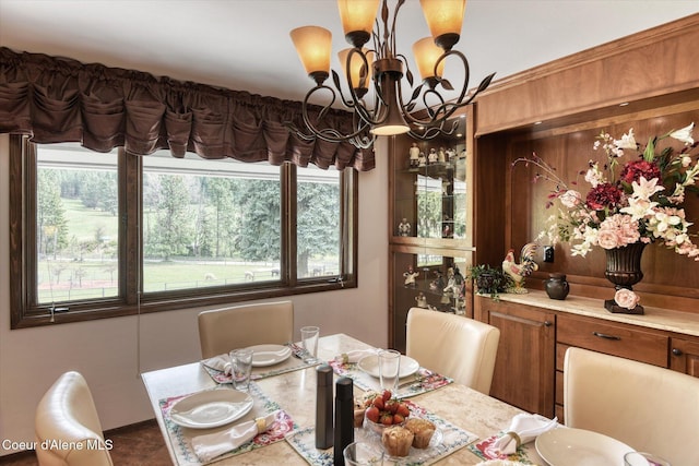 2885 S Folsom Ridge Rd, Coeur Dalene, ID 83814 - dining area with a chandelier